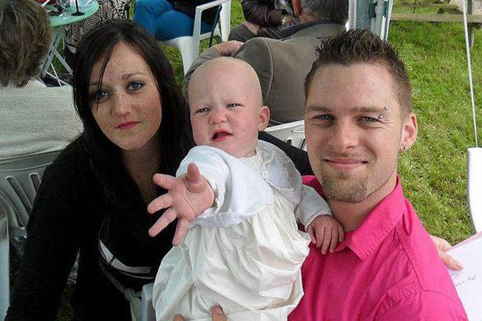 Michelle and Kevin Grantham with one of their daughters