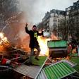 In Paris, yellow vest protesters set up burning barricades as they took to the streets for another Saturday protest against Macron's pro-market policies