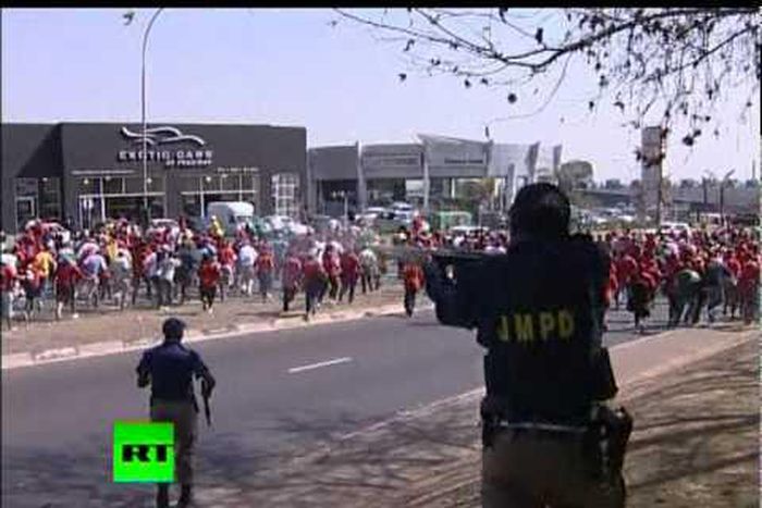 South African police fire rubber bullets at school protest