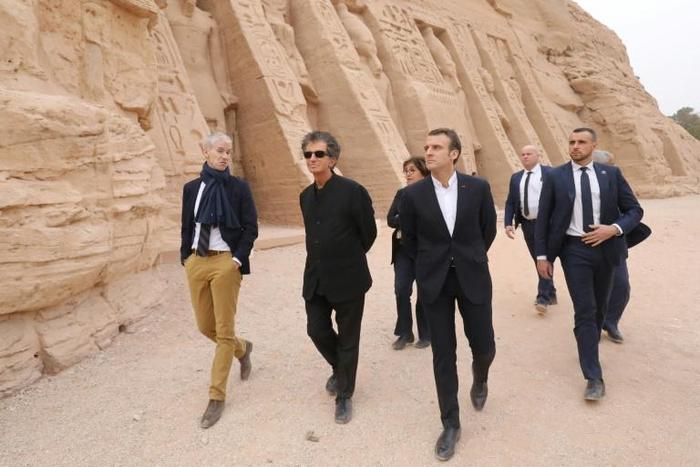 French President Emmanuel Macron (foreground) visits the temple of Abu Simbel in Egypt on January 27, 2019