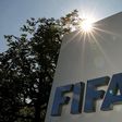 The logo of FIFA is seen in front of its headquarters in Zurich, Switzerland July 20, 2015. REUTERS/Arnd Wiegmann