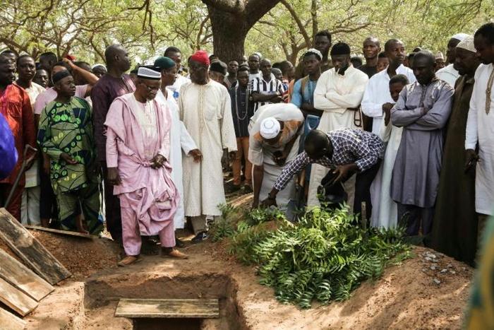 Mourners attend the funeral of Ghanaian journalist Ahmed Husein Suale who was gunned after working on a high-profile investigation in corruption in African football