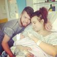 Caitlin Walsh and Jack Risso with their baby boy on the day he was born.