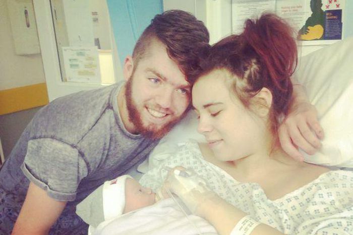 Caitlin Walsh and Jack Risso with their baby boy on the day he was born.