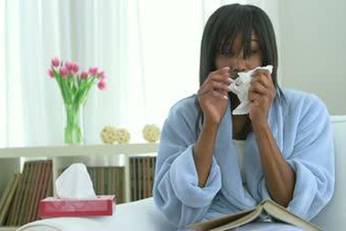 ___3777903___https:______static.pulse.com.gh___webservice___escenic___binary___3777903___2015___5___20___13___stock-footage-black-woman-with-cold-blowing-nose-into-tissue