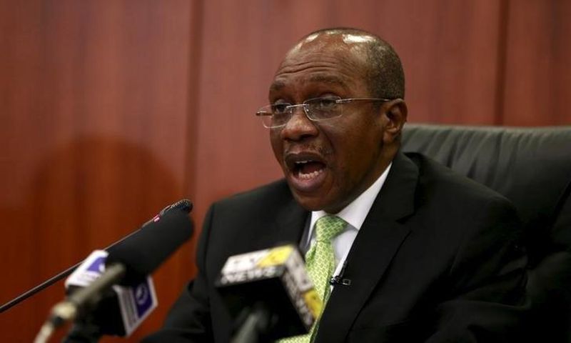 Governor Godwin Emefiele announces that Nigeria's central bank is keeping its benchmark interest rate on hold at 13 percent in Abuja, Nigeria, July 24, 2015. REUTERS/Afolabi Sotunde