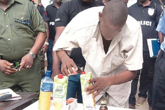 Isah Buruku showing the police how he misses his drugs.