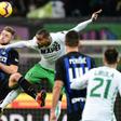 Boateng (R) challenges for a high ball during Sassuolo's draw away to Inter in Serie A at the weekend
