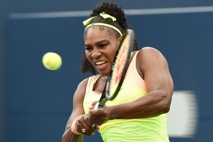 Aug 11, 2015; Toronto, Ontario, Canada; Serena Williams of the United States hits a shot against Flavia Pennetta of Italy (not pictured) during the Rogers Cup tennis tournament at Aviva Centre. Mandatory Credit: Dan Hamilton-USA TODAY Sports