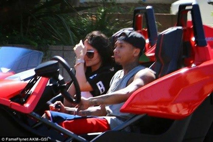 Tyga takes Kylie on a riding in his three wheel motorcycle