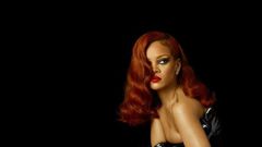 Rihanna wears an over-the-knee sock from her "Murder Rih Wrote" collection for Stance