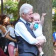 Bill Clinton plays with granddaughter at New York City’s Madison Square Park