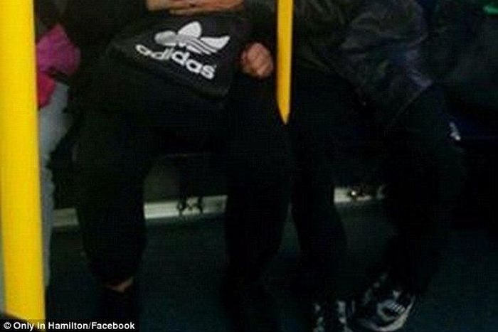 Picture of a young man helping a special needs stranger goes viral