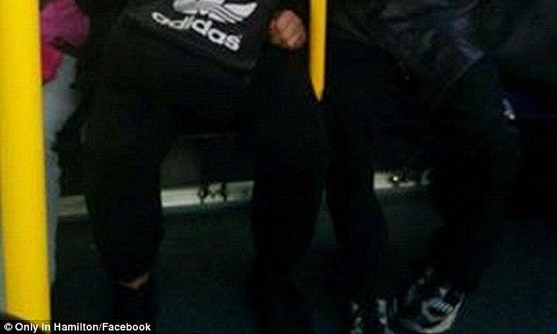 Picture of a young man helping a special needs stranger goes viral
