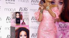 Bad girl RiRi, steps out in pink retro look for the launch of her new perfume line, RiRi by Rihanna, at Macy's, New York