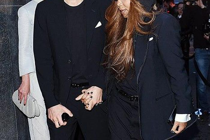 Wissam Al Manaso and Janet Jackson walking hand in hand