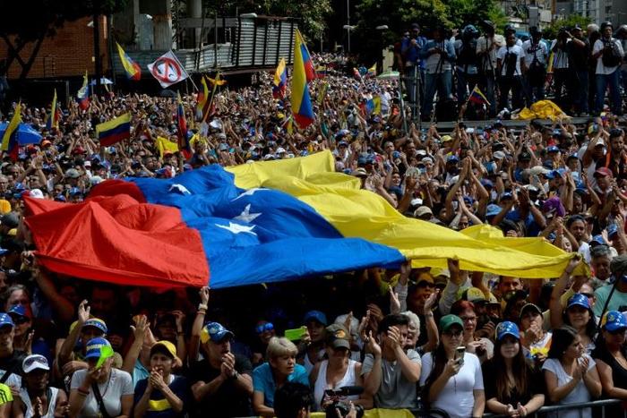Protesters rally in Caracas in support of Juan Guaido, who the United States says is the legitimate interim president of Venezuela