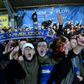 Up for the Cup: AFC Wimbledon fans celebrate their 4-2 victory over West Ham in the fourth round of the FA Cup