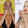 Why did Rita Ora cover up at her massive hand tattoo at the 2015 VMAs?