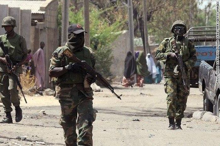 Nigerian soldiers on guard in one of Borno villages.