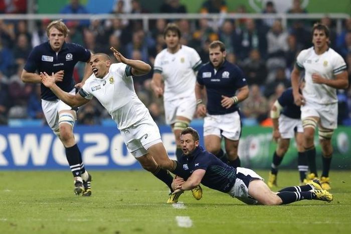 James' Park, Newcastle, England - 3/10/15 Scotland's Greig Laidlaw fouls South Africa's Bryan Habana Reuters / Phil Noble Livepic