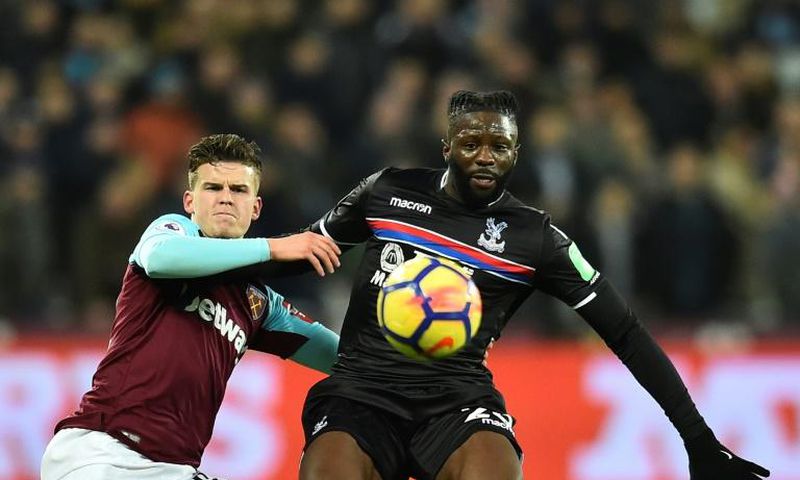 Bakary Sako (R) pictured in action for Crystal Palace against West Ham in January last year, has returned to the Eagles