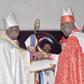 Dr Asafo-Agyei Anane Frempong (left) receiving the certificate of office after being sworn in