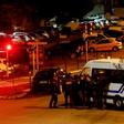 The gunman holed up in his building after opening fire in the street