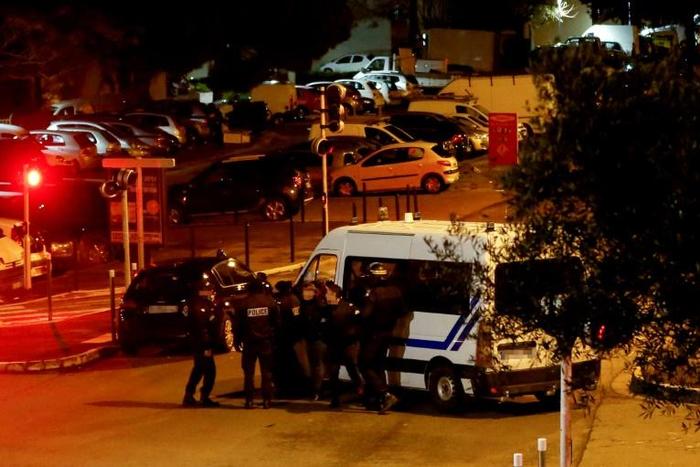 The gunman holed up in his building after opening fire in the street