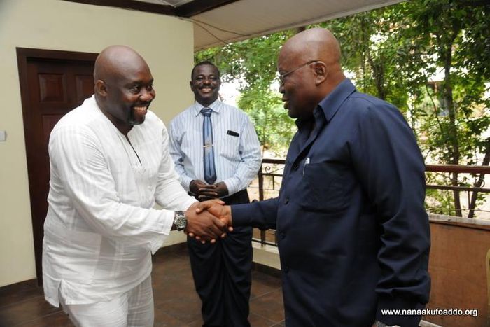 George Andah shaking hands with Nana Addo
