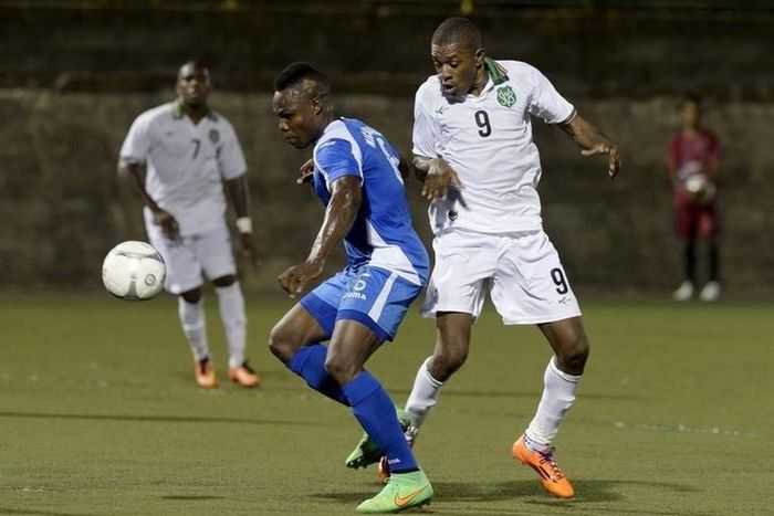 Nicaragua's Luis Fernando (L) and Suriname's Gregory Rigters fight for the ball during their 2018  World Cup qualifiers at the National Stadium in Managua June 7, 2015. REUTERS/Oswaldo Rivas