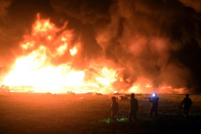 Flames burn at the scene of a massive blaze triggered by a leaky pipeline in Tlahuelilpan, Hidalgo state, on January 18, 2019