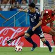 Japan midfielder Shinji Kagawa playing Belgium in the World Cup