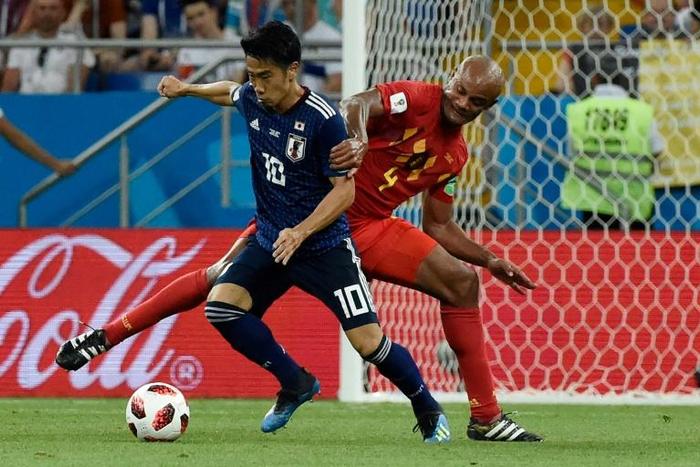 Japan midfielder Shinji Kagawa playing Belgium in the World Cup