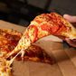 Man orders pizza but he was stunned when he opened the box to find $1300 (N270,000)