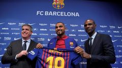 Kevin-Prince Boateng (C) is unveiled by Barcelona after joining the club on loan for the rest of the season