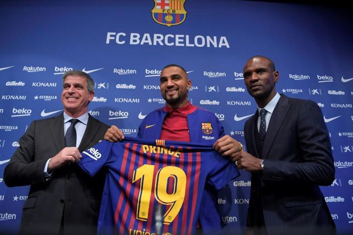 Kevin-Prince Boateng (C) is unveiled by Barcelona after joining the club on loan for the rest of the season