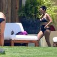 Kourtney Kardashian spotting a black bikini and high waist in Mexico