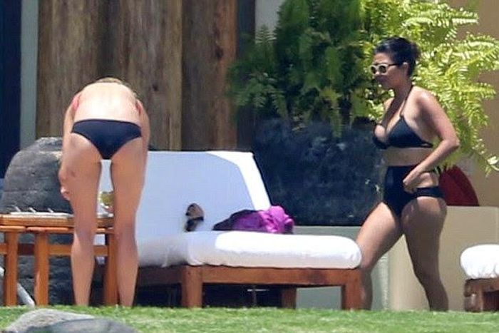 Kourtney Kardashian spotting a black bikini and high waist in Mexico