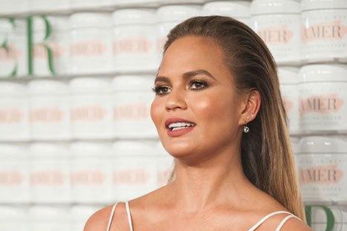 Chrissy Teigen shows off baby bump