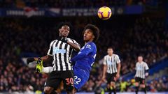 Christian Atsu fights for the ball with Chelsea's Willian