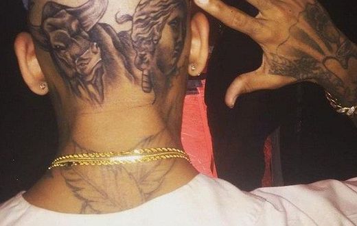 Chris Brown shows off bizarre head tattoo