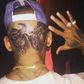 Chris Brown shows off bizarre head tattoo
