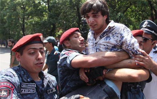Armenian riot police earlier detained dozens of protesters and shortly released them [Getty Images]