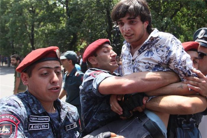 Armenian riot police earlier detained dozens of protesters and shortly released them [Getty Images]