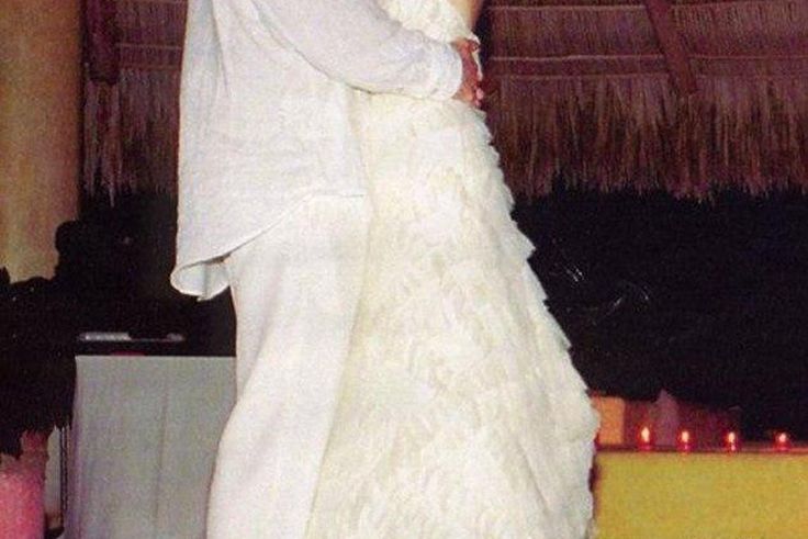 The 38-yr-old 'Buffy The Vampire Slayer' star, took to Instagram to post a photo of herself and her husband's wedding way back in 2002