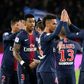 Edinson Cavani celebrates with his teammates after scoring one of his two goals in PSG's 4-1 win over Rennes on Sunday