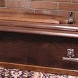 Dead woman comes back to life in a coffin.