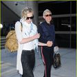 Ellen DeGeneres and wife, Portia de Rossi hold hands at Los Angeles airport