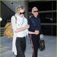Ellen DeGeneres and wife, Portia de Rossi hold hands at Los Angeles airport